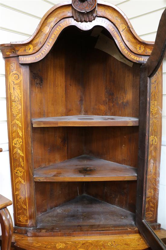 A 19th century Dutch walnut and marquetry corner vitrine, H.200cm